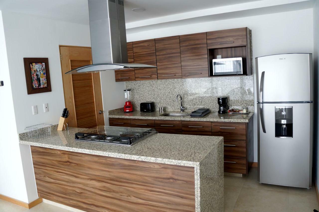 Metropolitan Suites 사포판 외부 사진