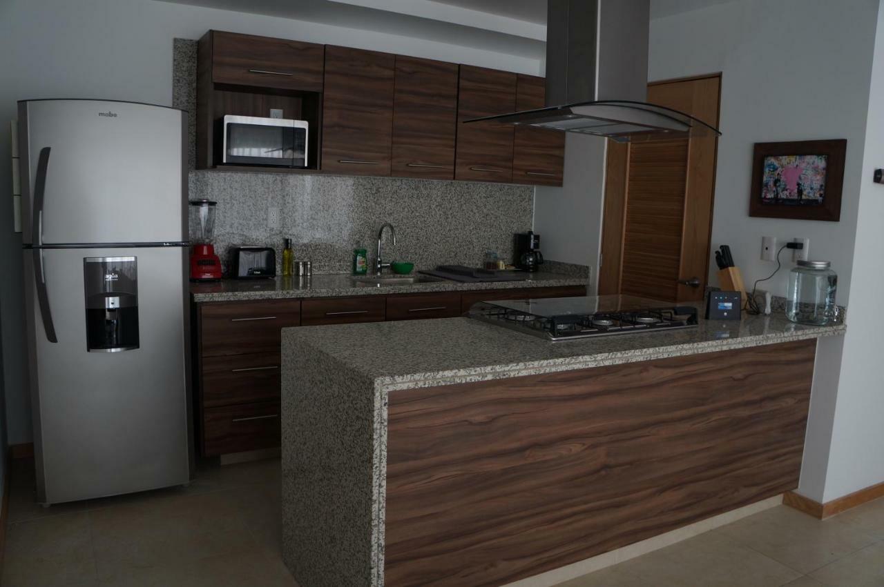 Metropolitan Suites 사포판 외부 사진